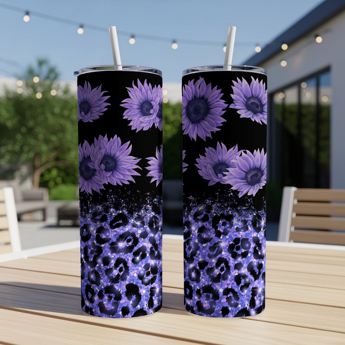 Two purple sunflower tumblers with leopard print and glitter detail.