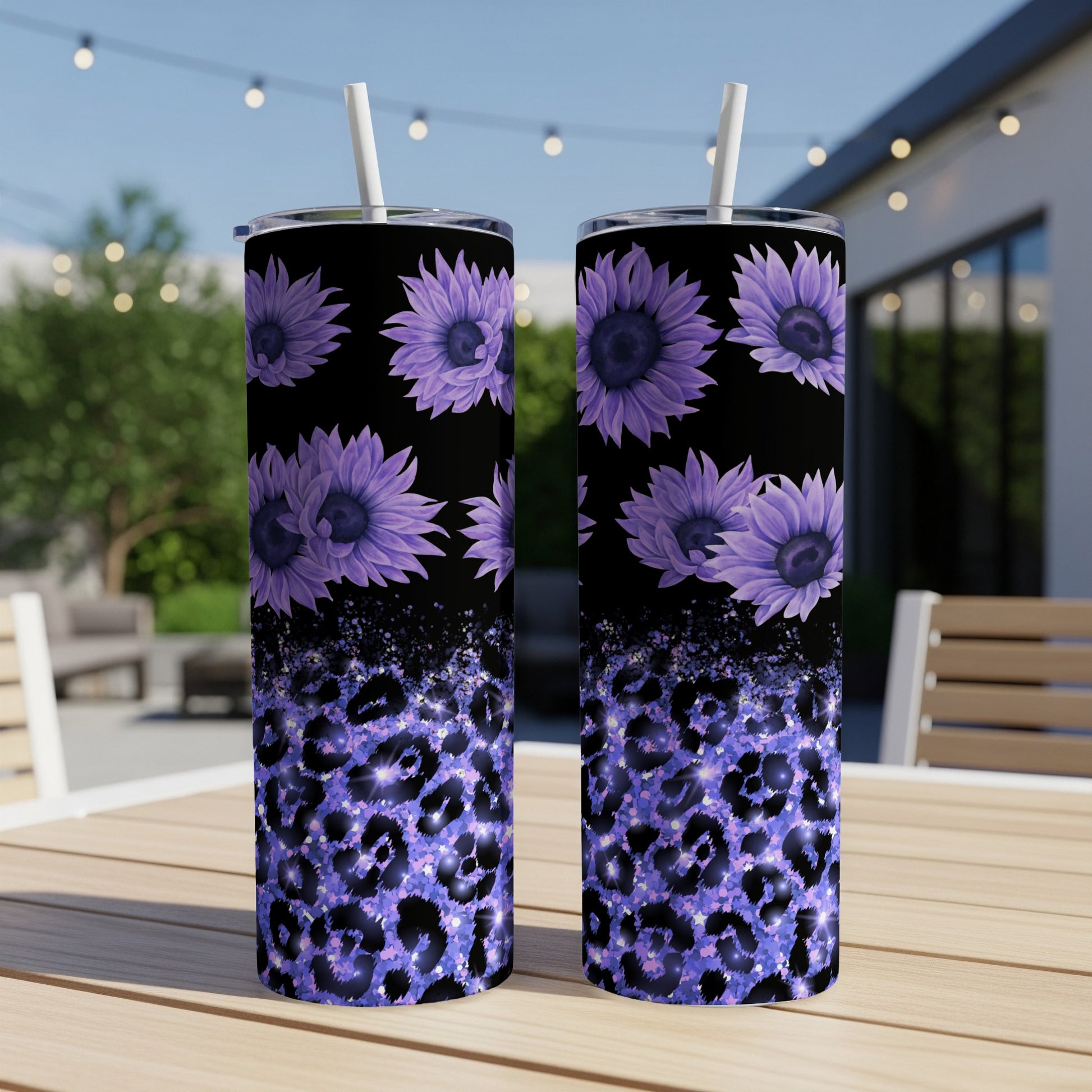 Two purple sunflower tumblers with leopard print and glitter detail.