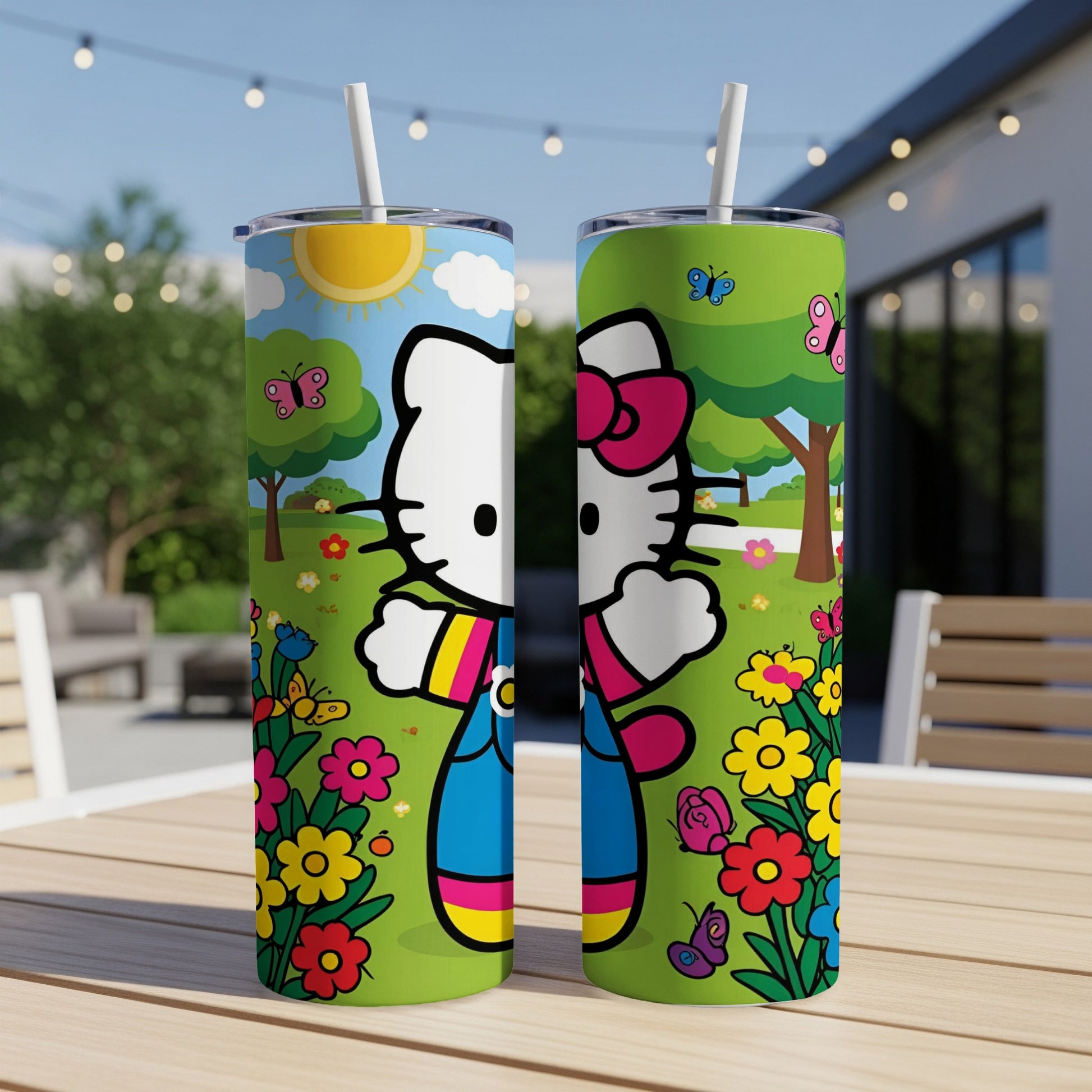 Hello Kitty tumbler with colorful flowers, butterflies, and a sunny outdoor scene.