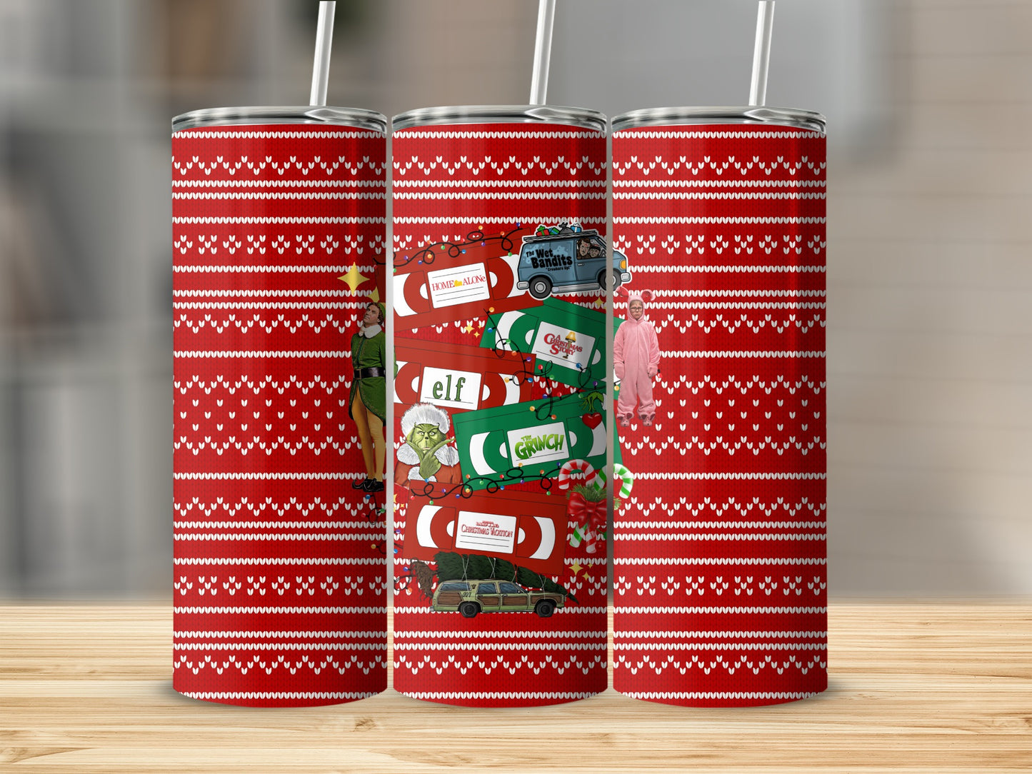 Christmas movie collage on red and white knit pattern tumbler with straws.