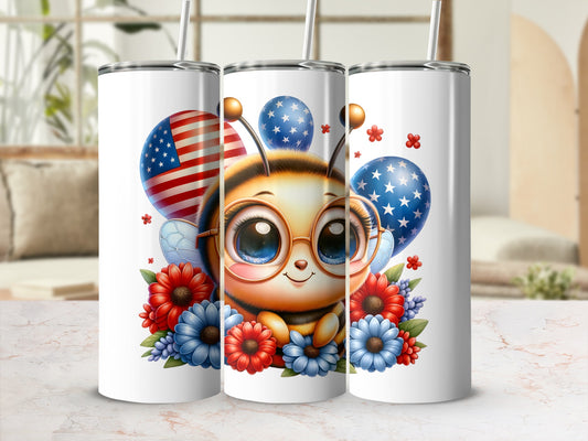 Cute bee with American flag balloons and flowers on a skinny tumbler.