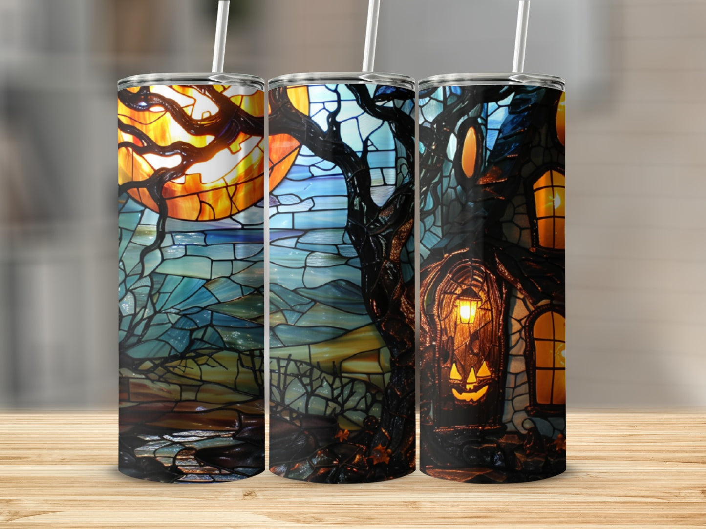 Stained glass tumbler with Halloween scene featuring a spooky house and moon.