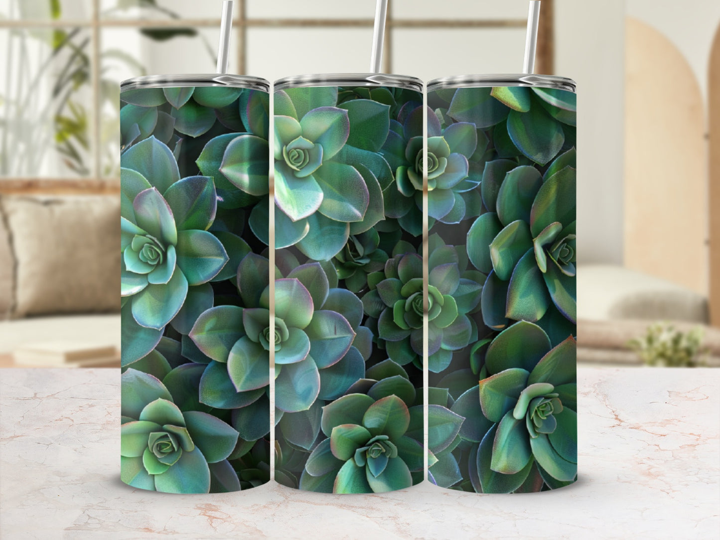 Three tall tumblers with a close-up succulent plant pattern.