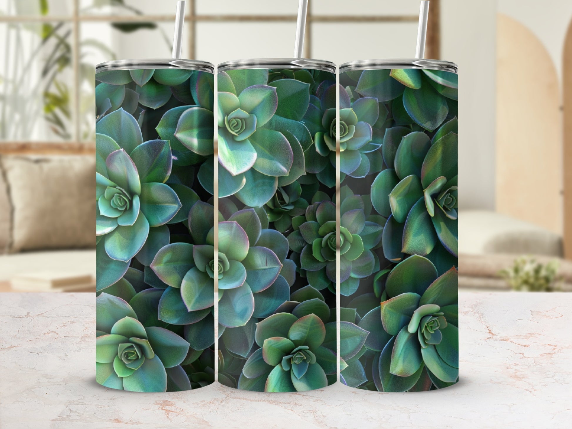 Three tall tumblers with a close-up succulent plant pattern.