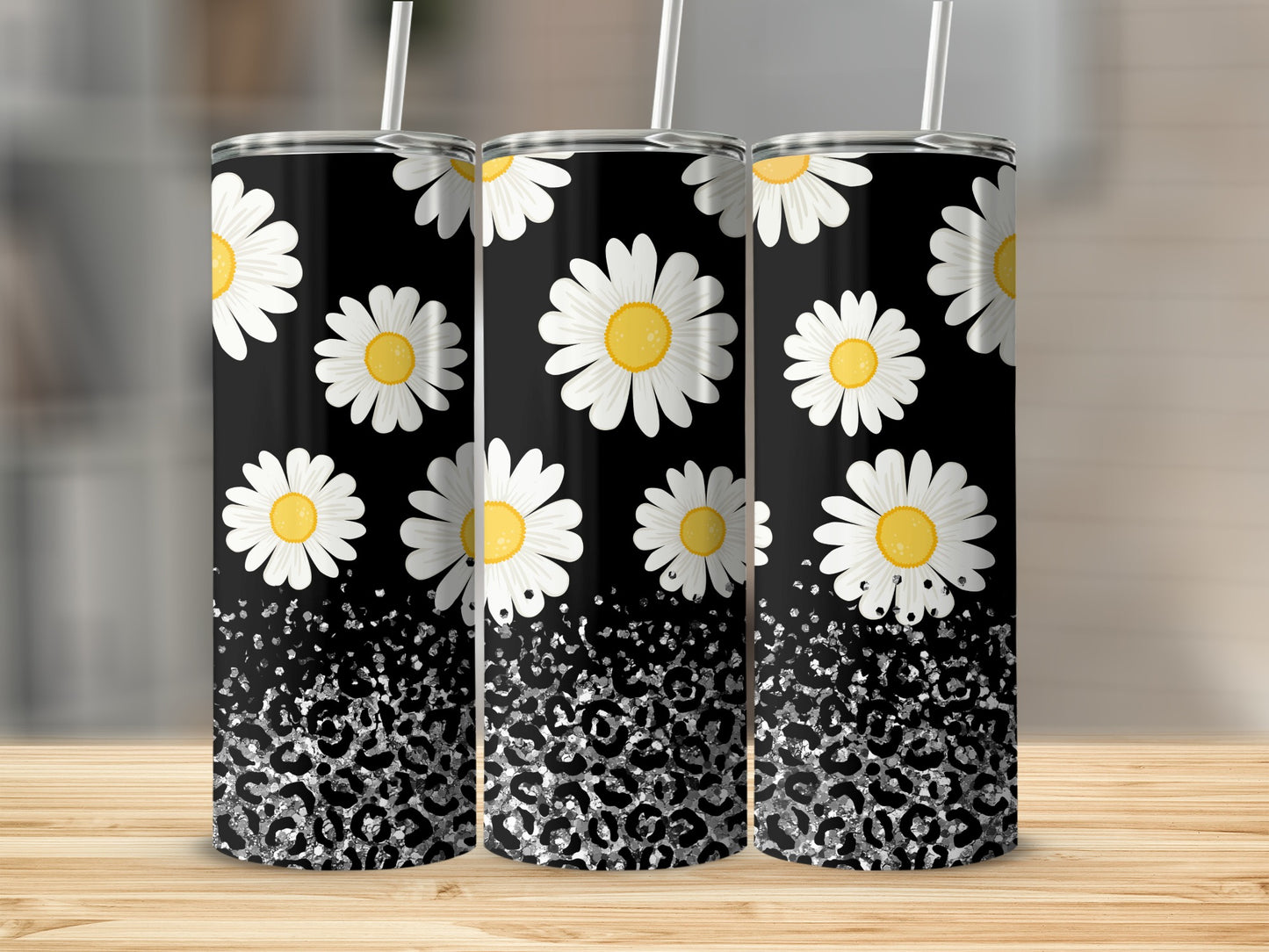 Black tumbler with white daisies and silver leopard print.