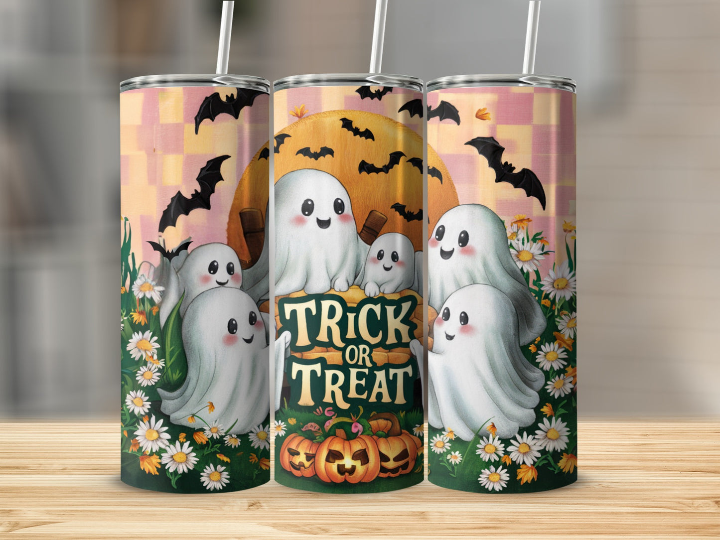 Three tumblers with Halloween ghosts, bats, pumpkins, and "Trick or Treat" text.