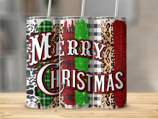 Three holiday tumblers with Merry Christmas text and plaid and animal prints.