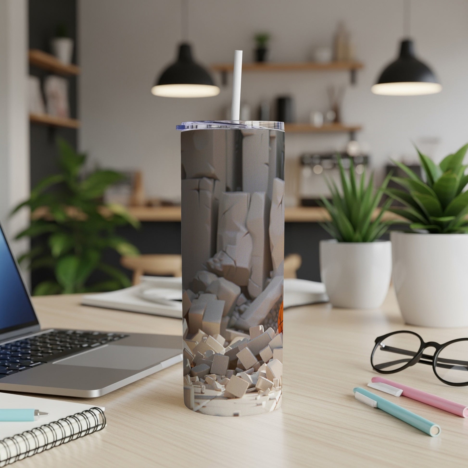 Tumbler with abstract geometric design of grey pillars and broken pieces.