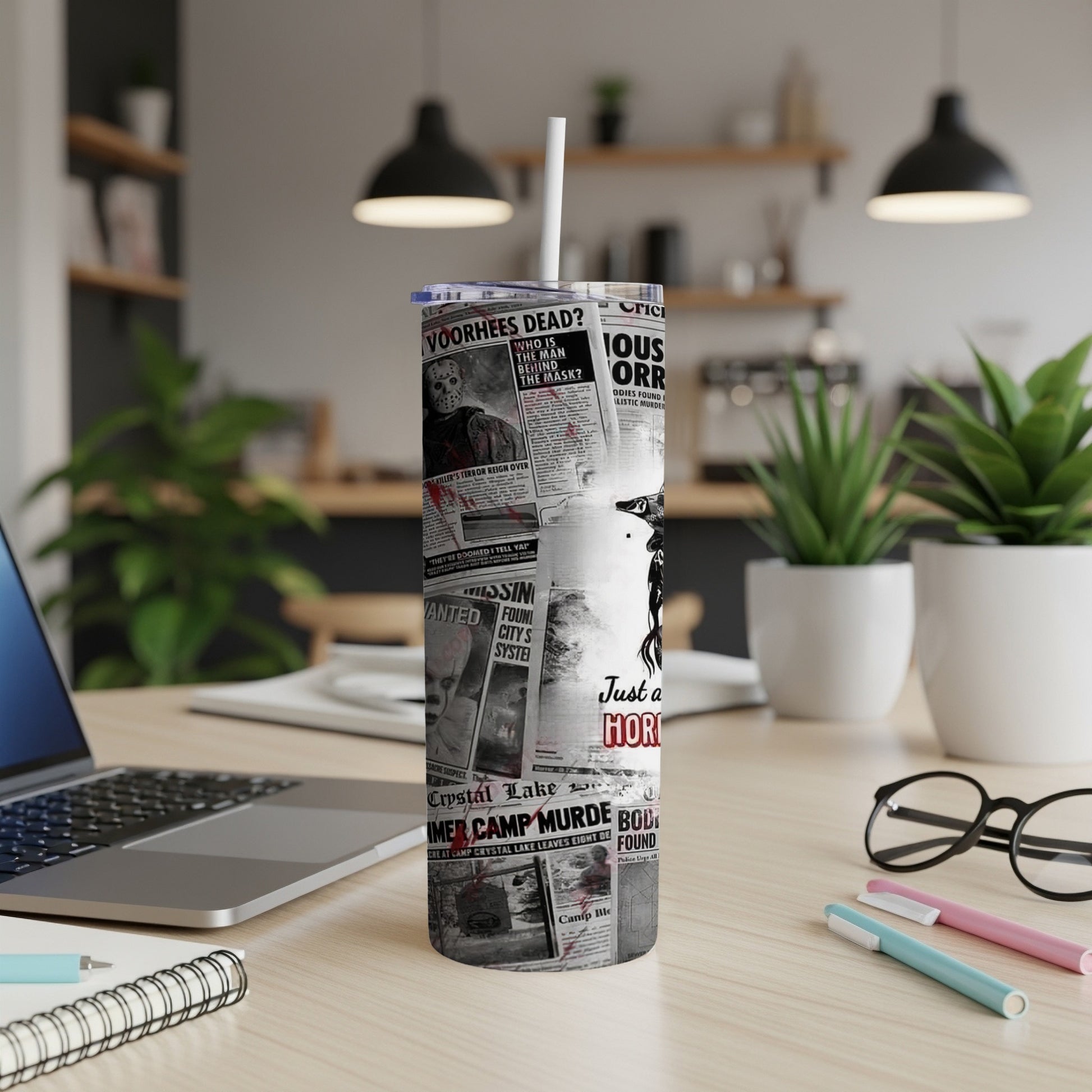 Tumbler with newspaper headlines about a killer and "Just a Hori".