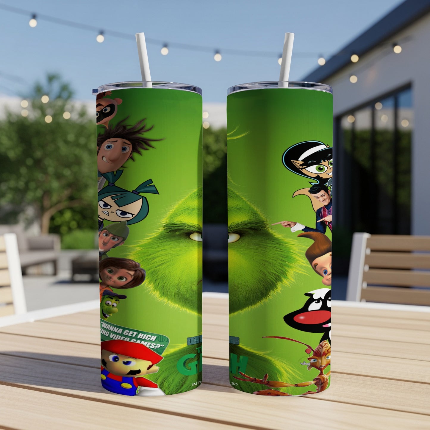 Green tumbler featuring characters from animated movies, including the Grinch and Mario.