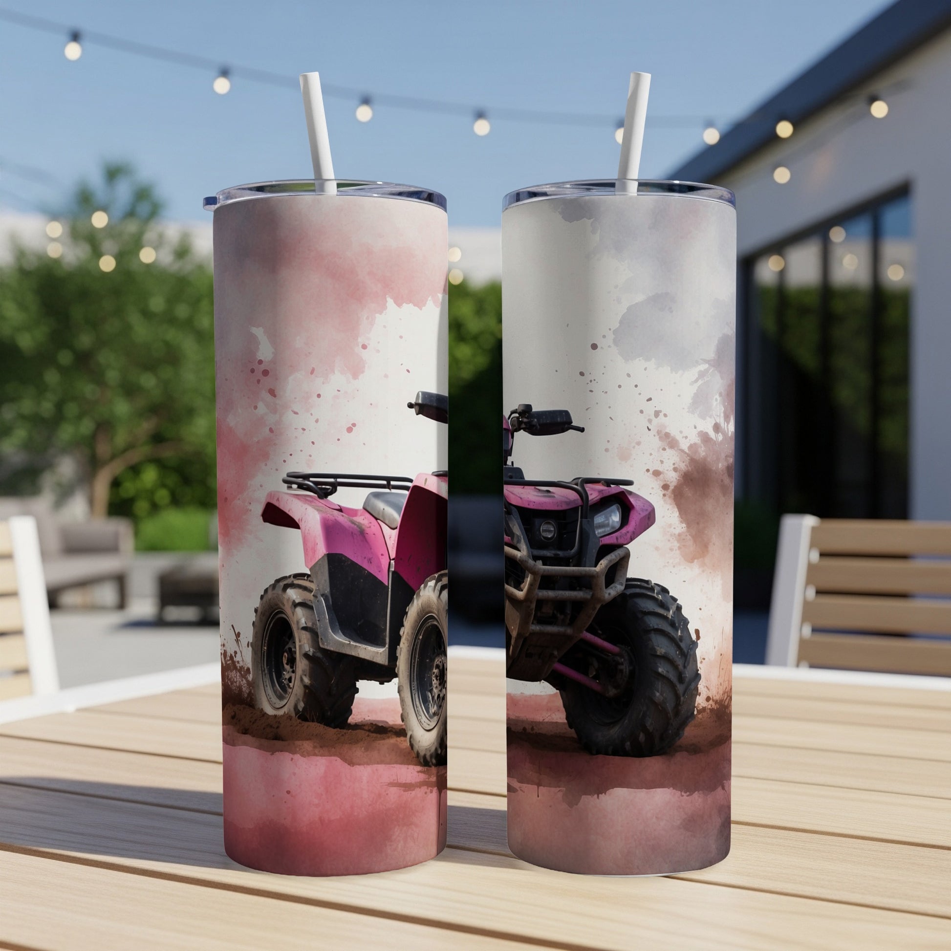 Pink ATV with watercolor splashes on a rustic table outdoors.