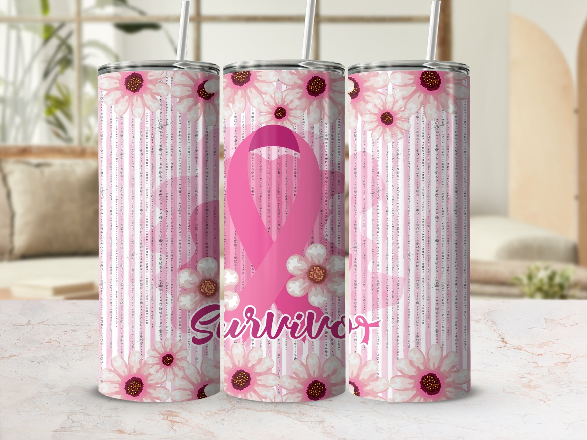Pink survivor ribbon with flowers on a striped tumbler.