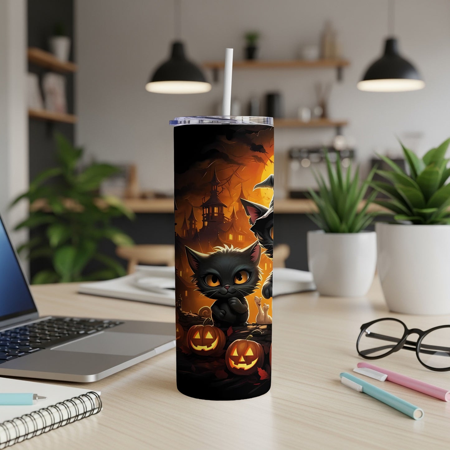 Black cat with pumpkins and haunted houses Halloween tumbler with straw.