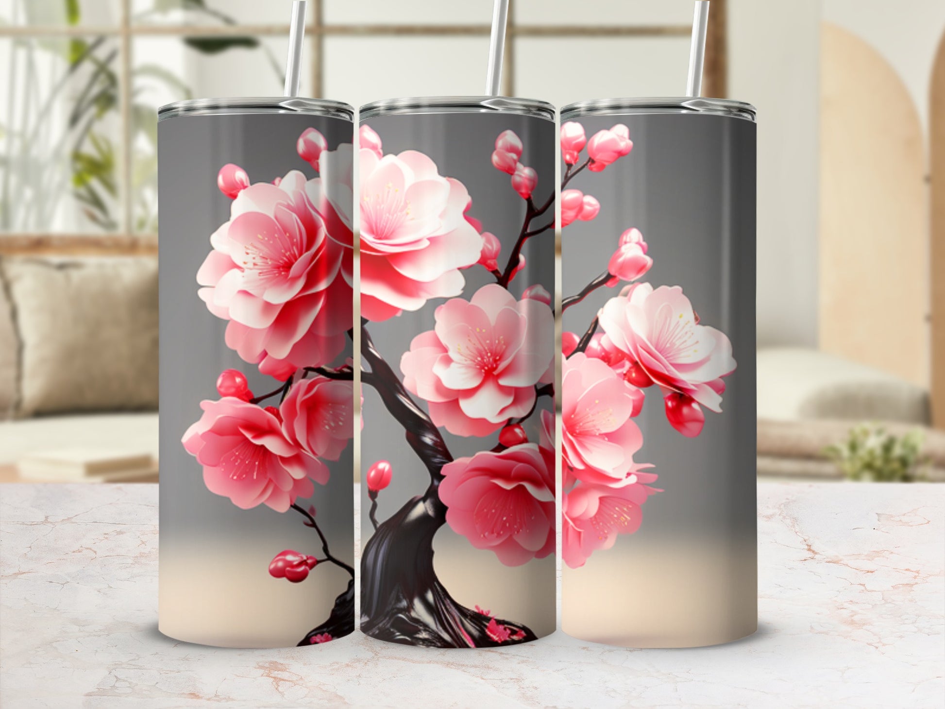 Three tumblers with a pink cherry blossom branch design.