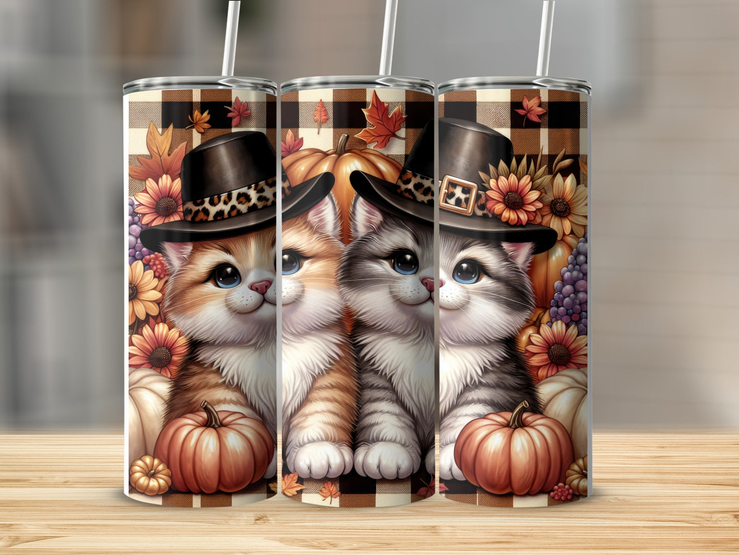 Two cartoon kittens wear pilgrim hats and sit with pumpkins and fall leaves.