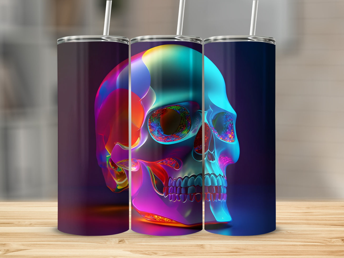 Colorful translucent skull design on three tumblers.