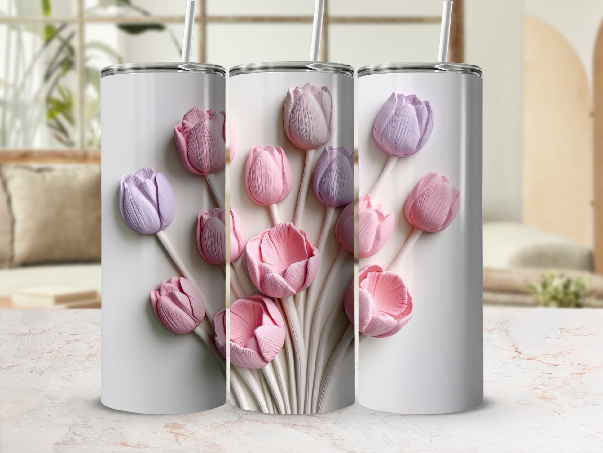 Three white tumblers with raised pink and purple tulip designs.