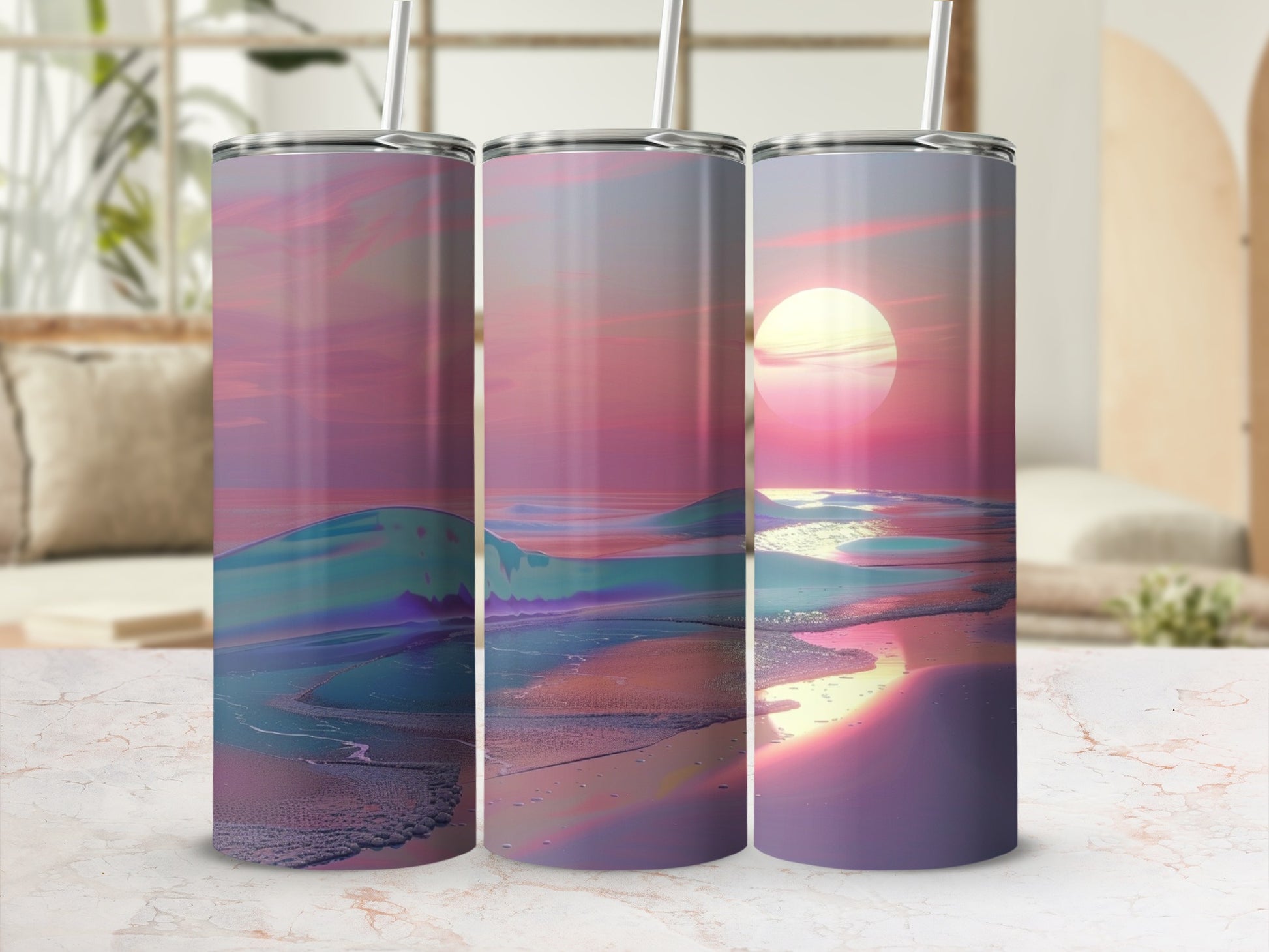Three tumblers with a sunset beach scene and pastel hues.
