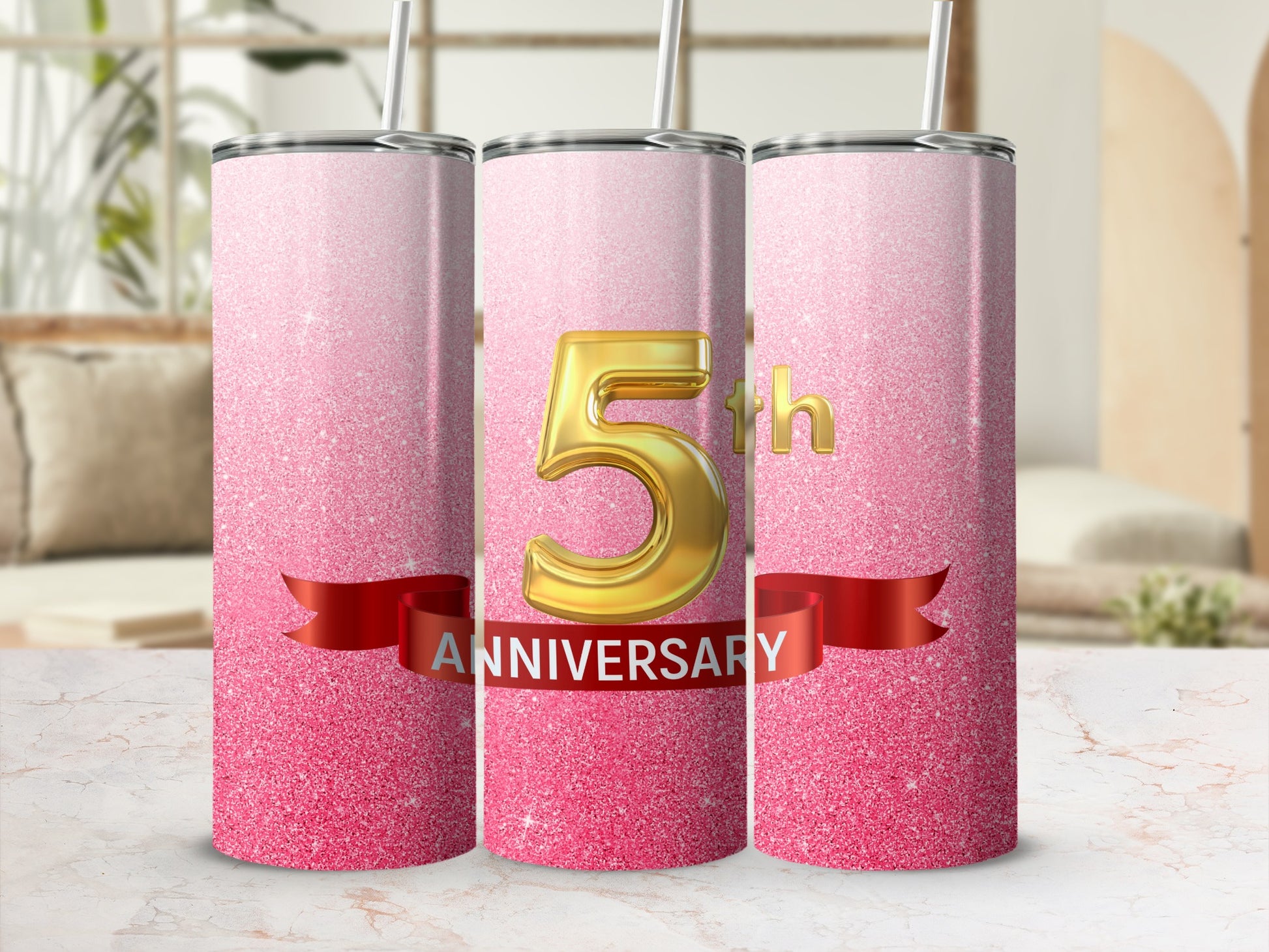 Pink glitter tumbler with "5th ANNIVERSARY" text and gold numbers.