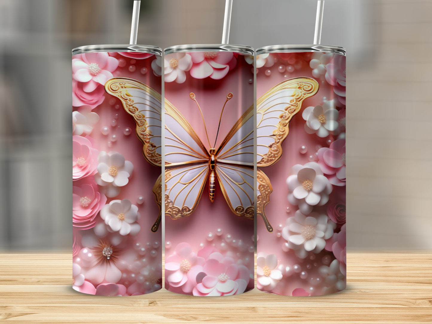 Pink tumbler with white and gold butterfly and floral design.