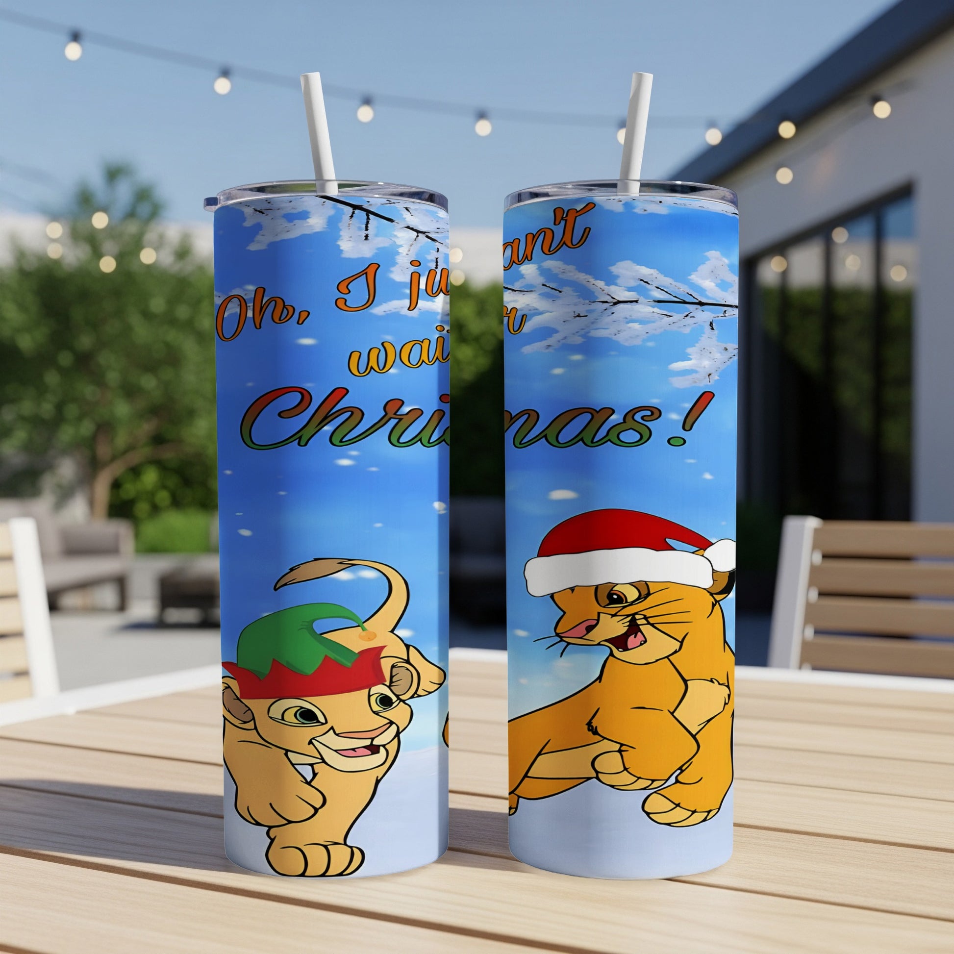 Simba and Nala wearing Santa and elf hats, on a Christmas tumbler.