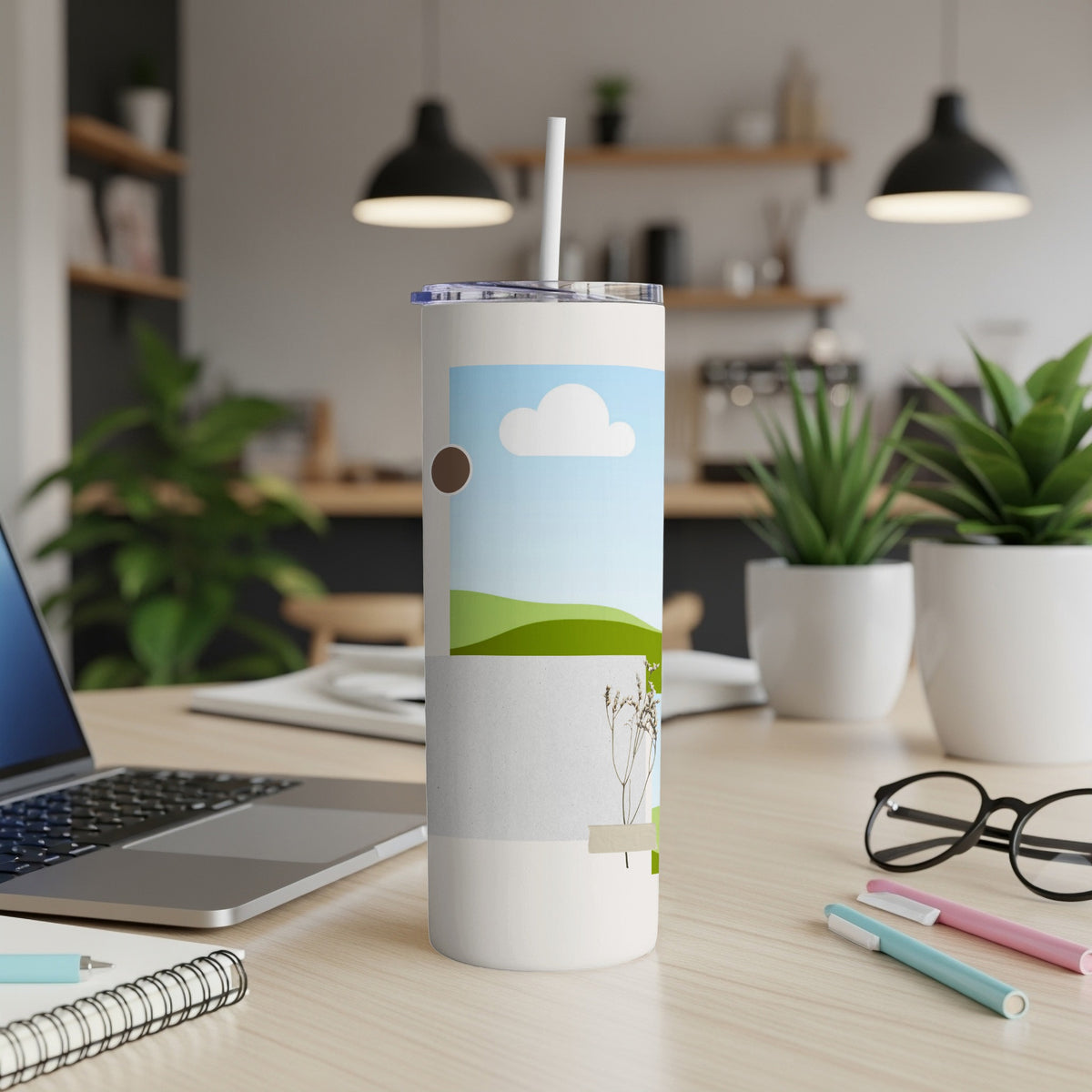 White tumbler with sky, clouds, hills, and dried flowers design.