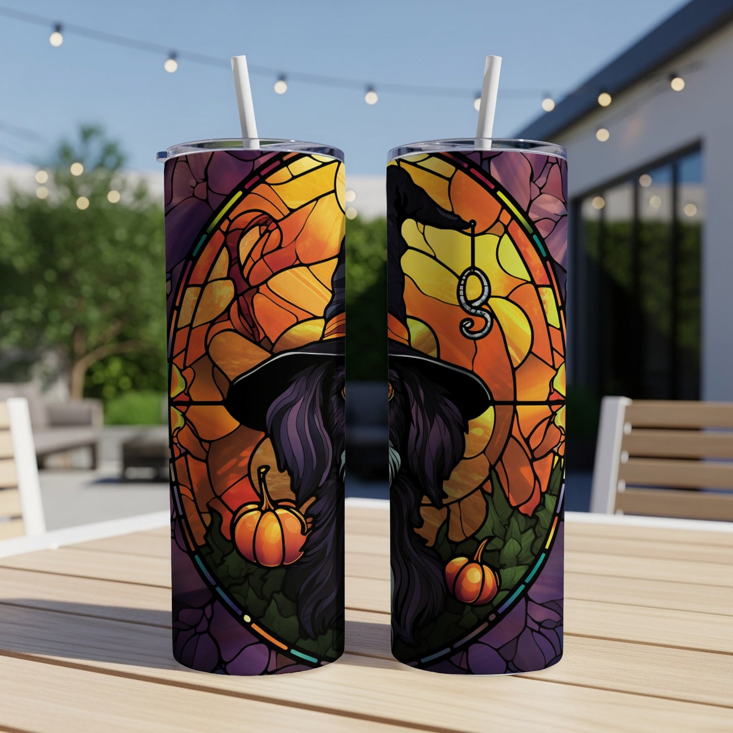 Two witch tumblers with stained glass pumpkin and Halloween design.