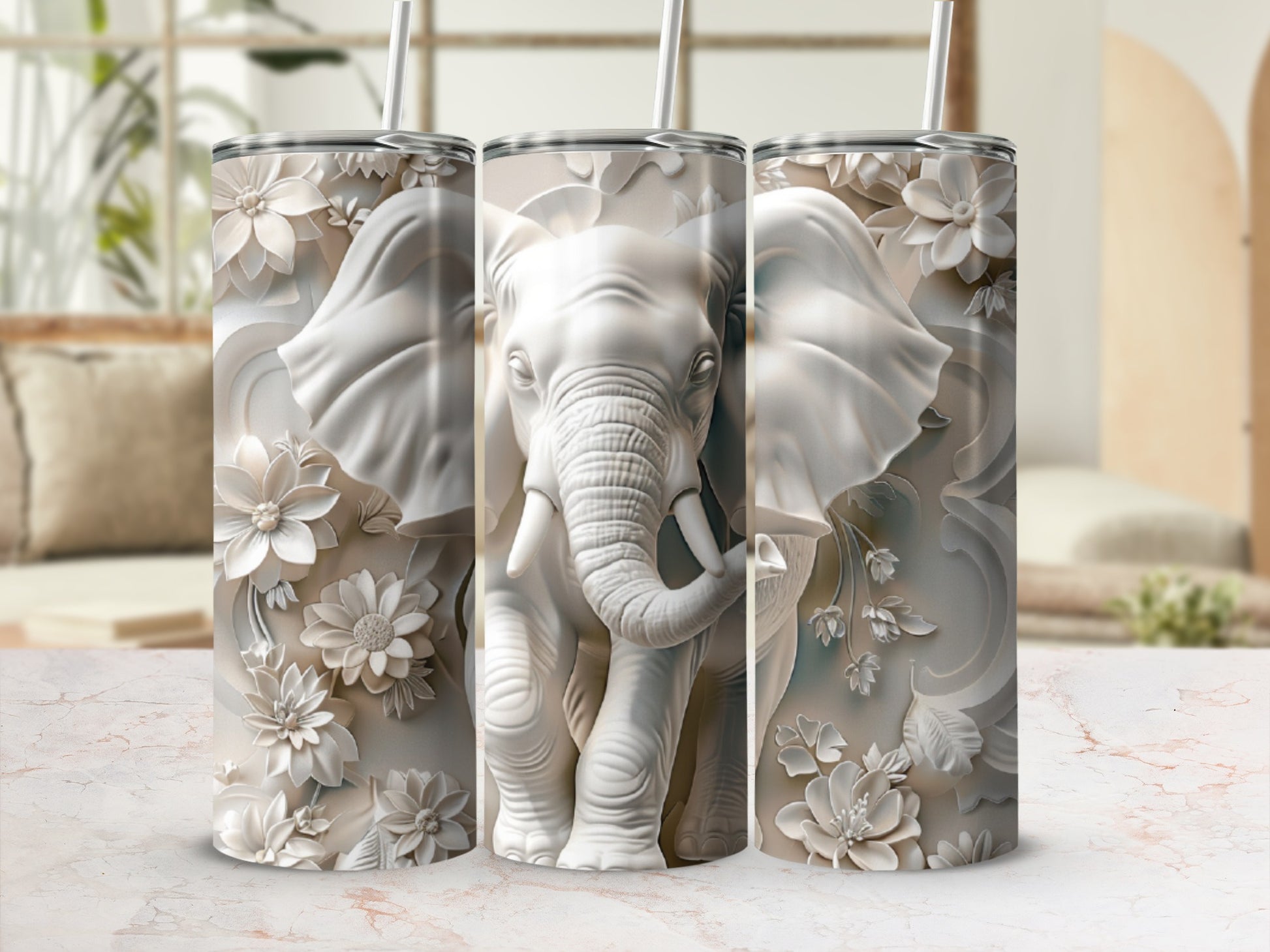White 3D embossed elephant with floral accents on a tumbler.