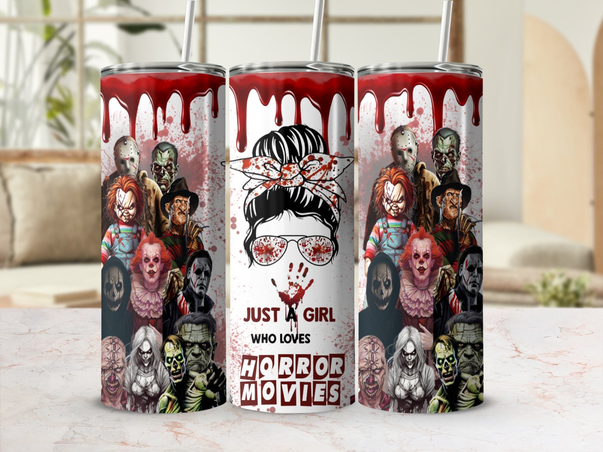 Tumbler with horror movie characters and "Just a girl who loves horror movies" text.