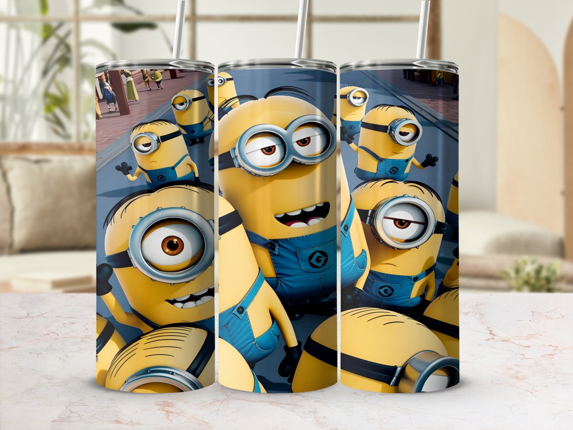 Minions characters in blue overalls with straw-topped cups.