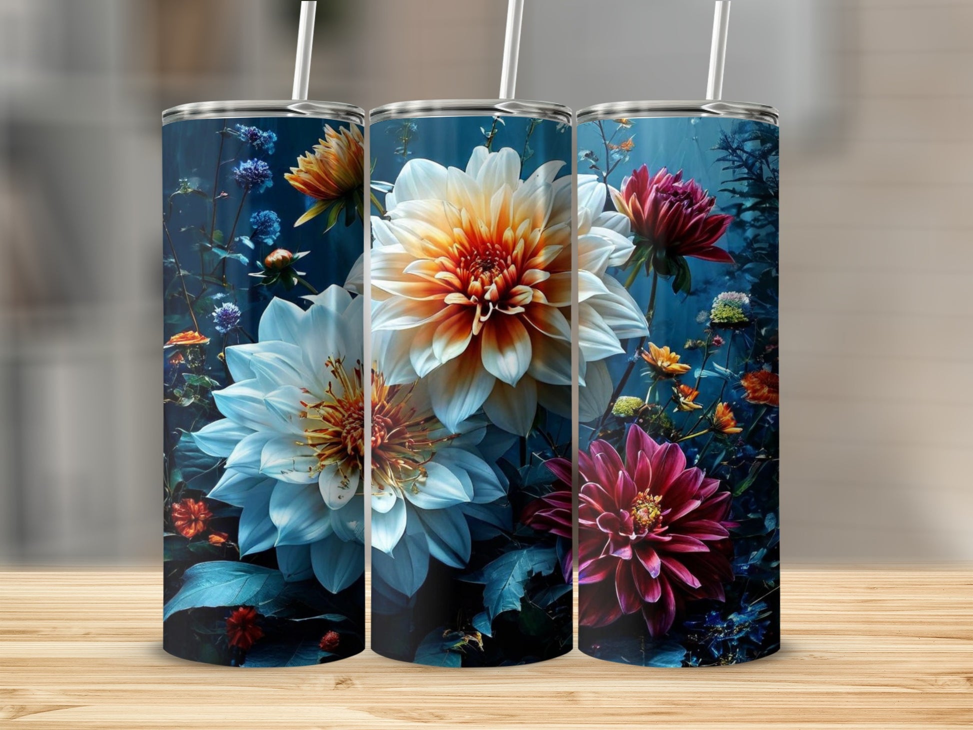 Three tumblers with detailed floral designs featuring dahlias and other blooms.
