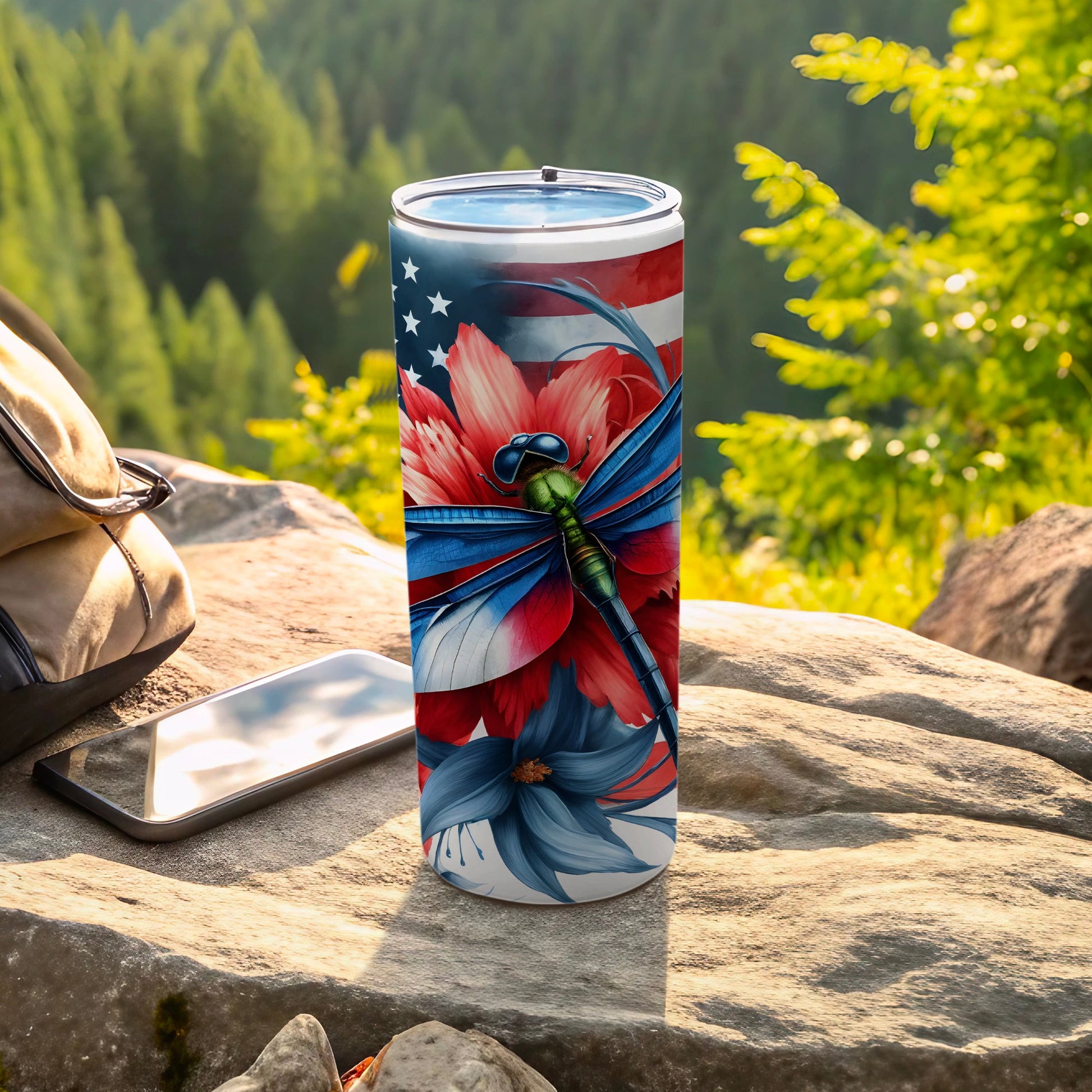 Dragonfly with American flag wings on a patriotic floral tumbler.