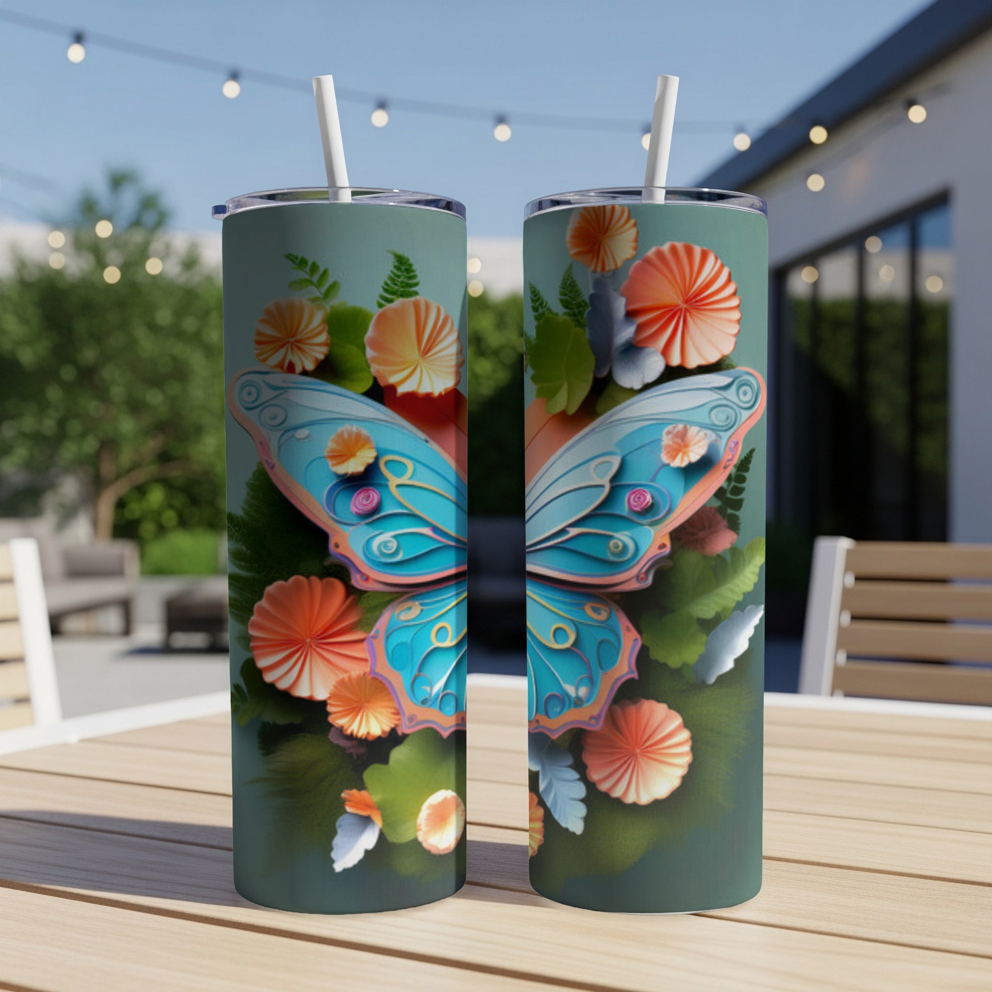 Two tumblers featuring a blue butterfly and orange floral designs.