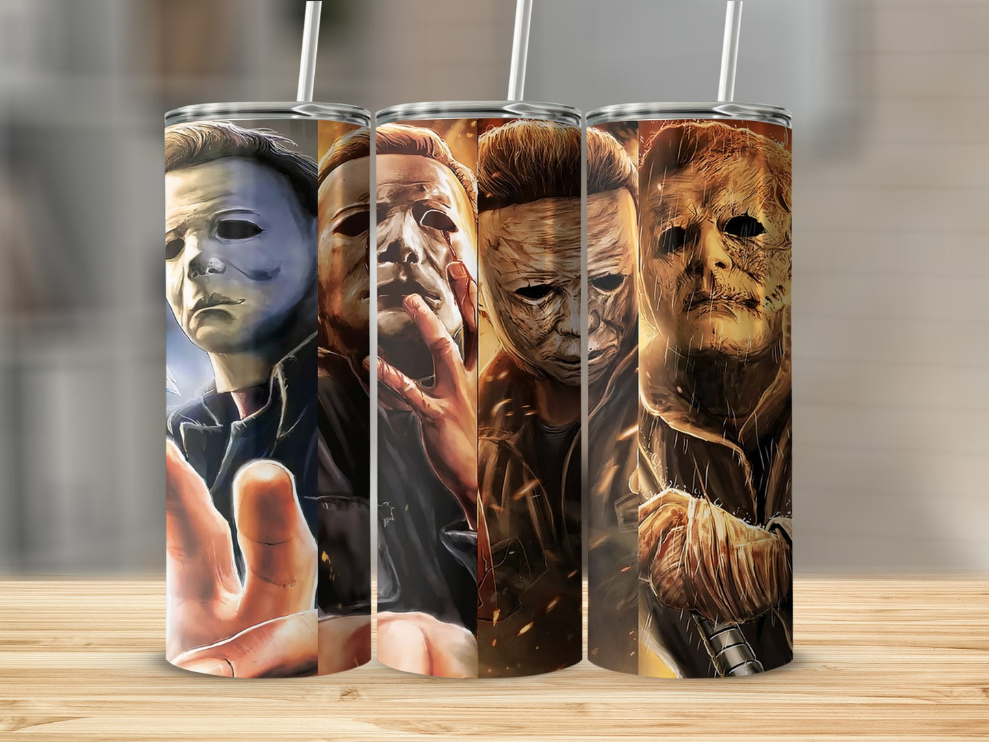 Michael Myers collage artwork on a tumbler with straw.