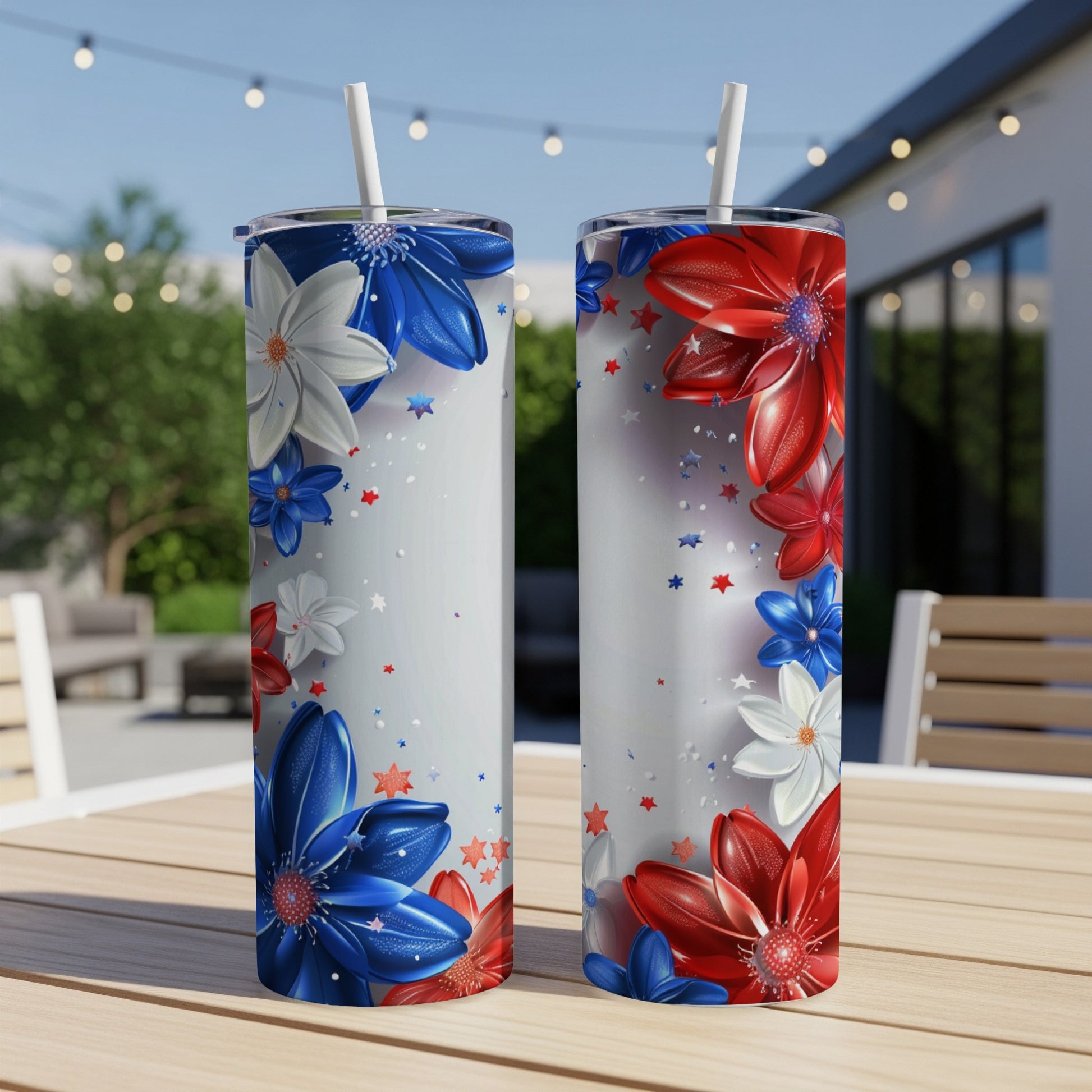 Two patriotic tumblers with red, white, and blue flowers and stars.