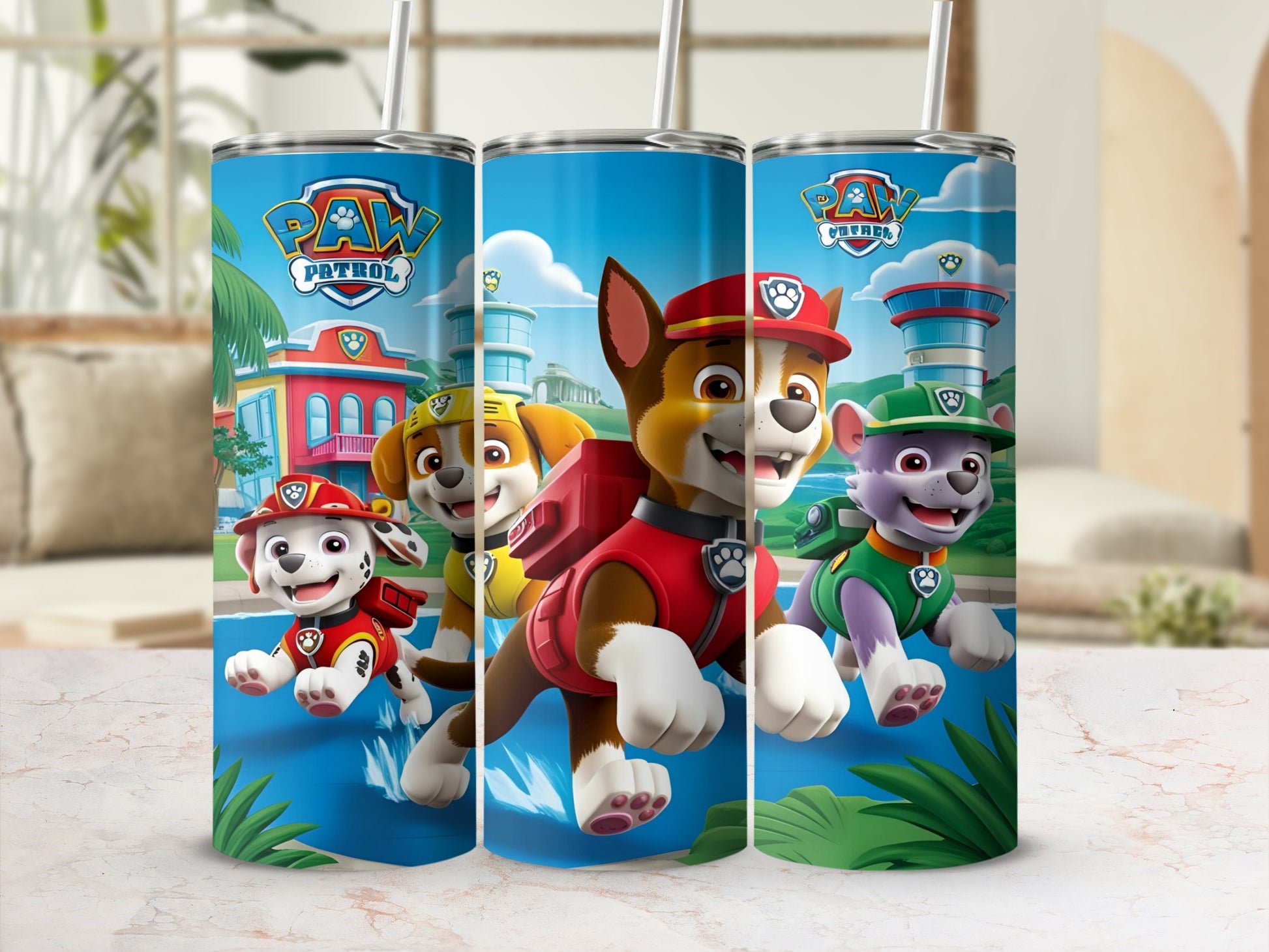 Paw Patrol characters Chase, Marshall, and Rubble on a blue tumbler with jungle background.