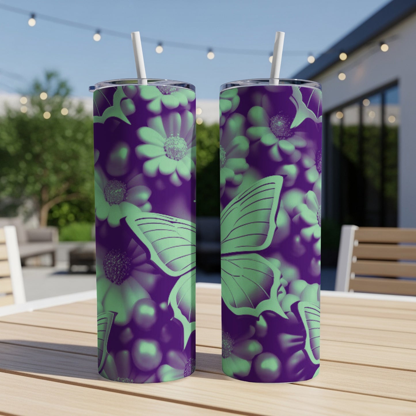 Two tumblers with a purple and green floral and butterfly design.