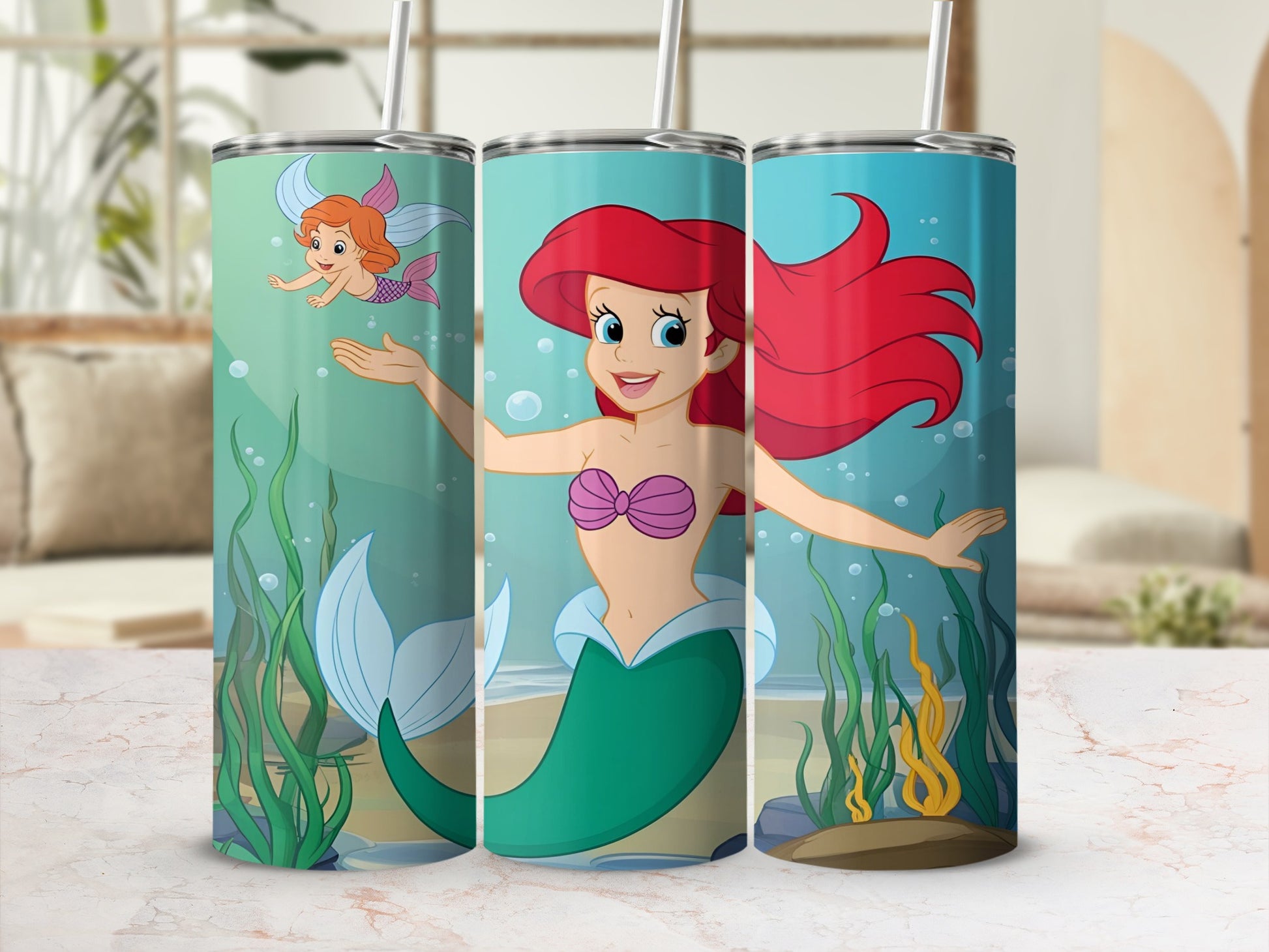 Ariel the mermaid on a teal tumbler with ocean background.