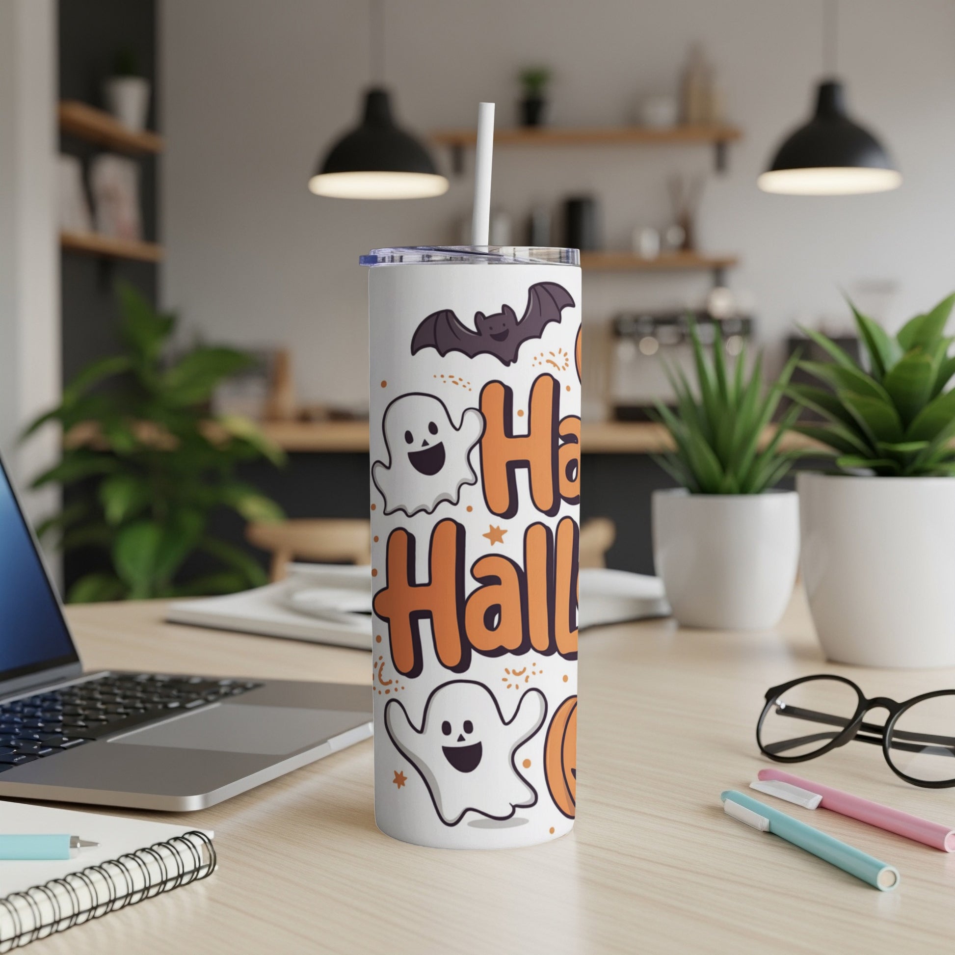 White tumbler with Halloween ghosts, bats, and "Happy Halloween" text.