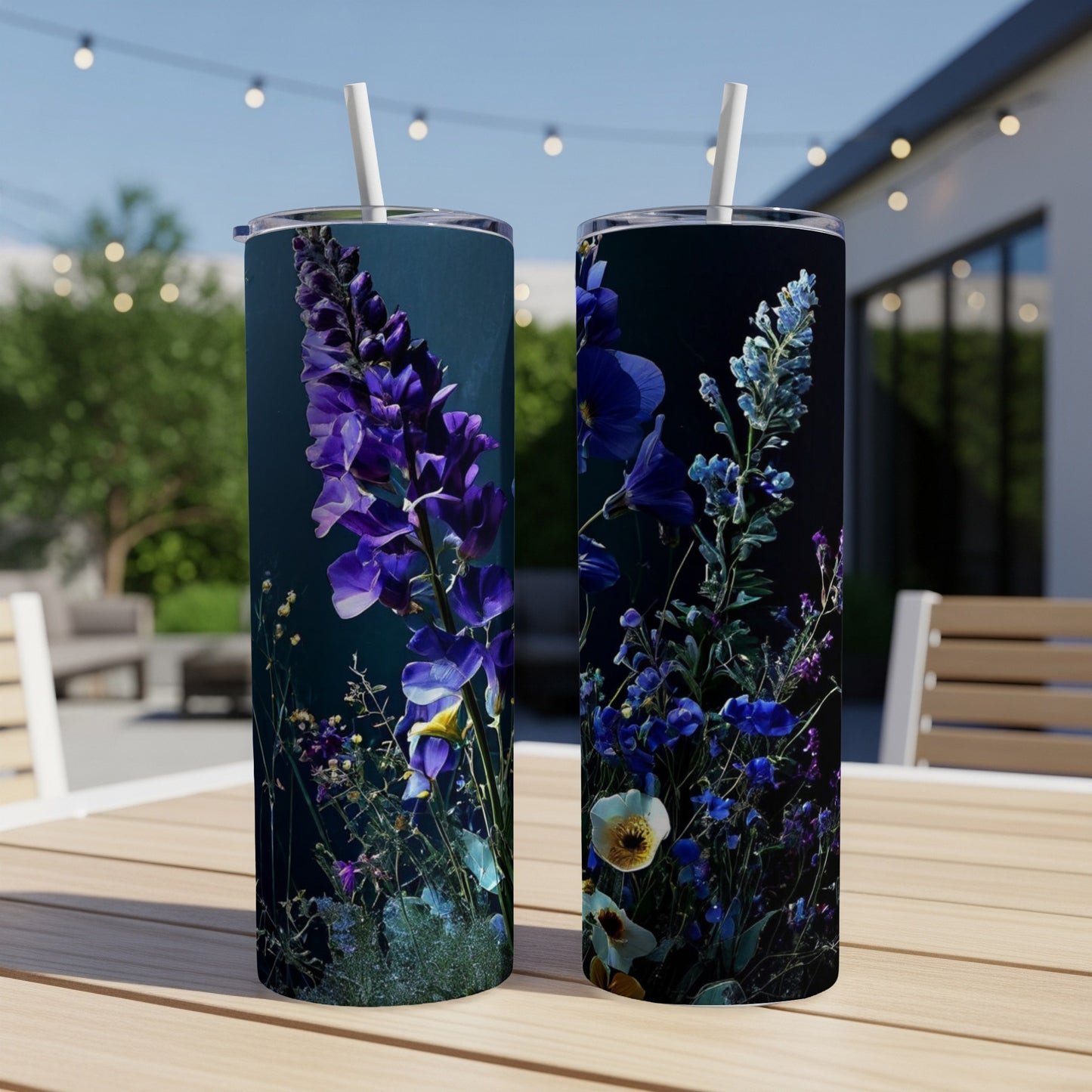 Two tumblers with a dark floral design featuring purple and blue wildflowers.