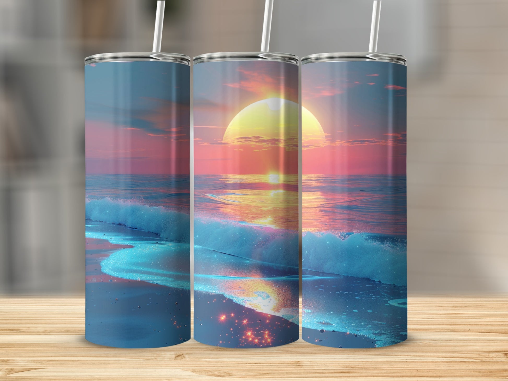 Three tumblers with sunset ocean wave design.