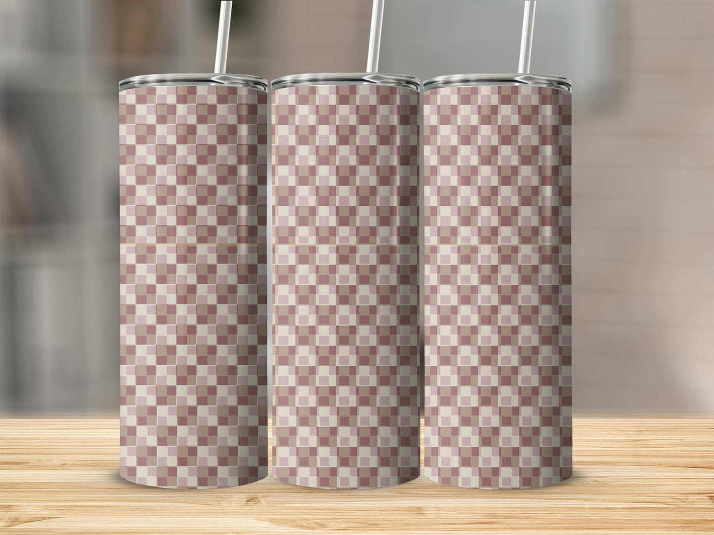 Three tall tumblers with a subtle checkerboard pattern in shades of pink and tan.