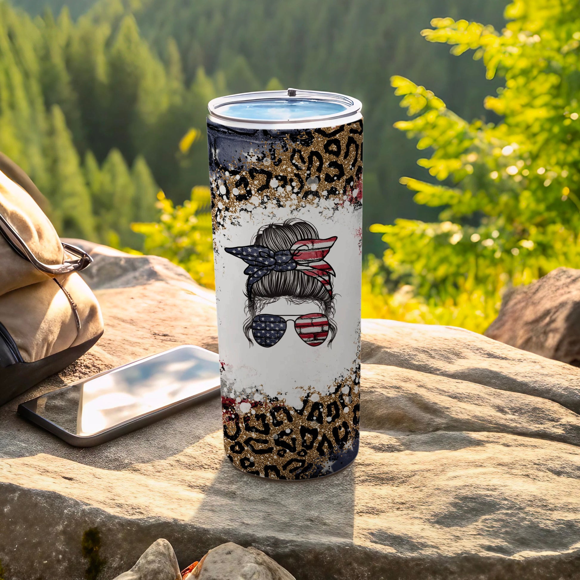 Tumbler with distressed US flag messy bun and leopard print.