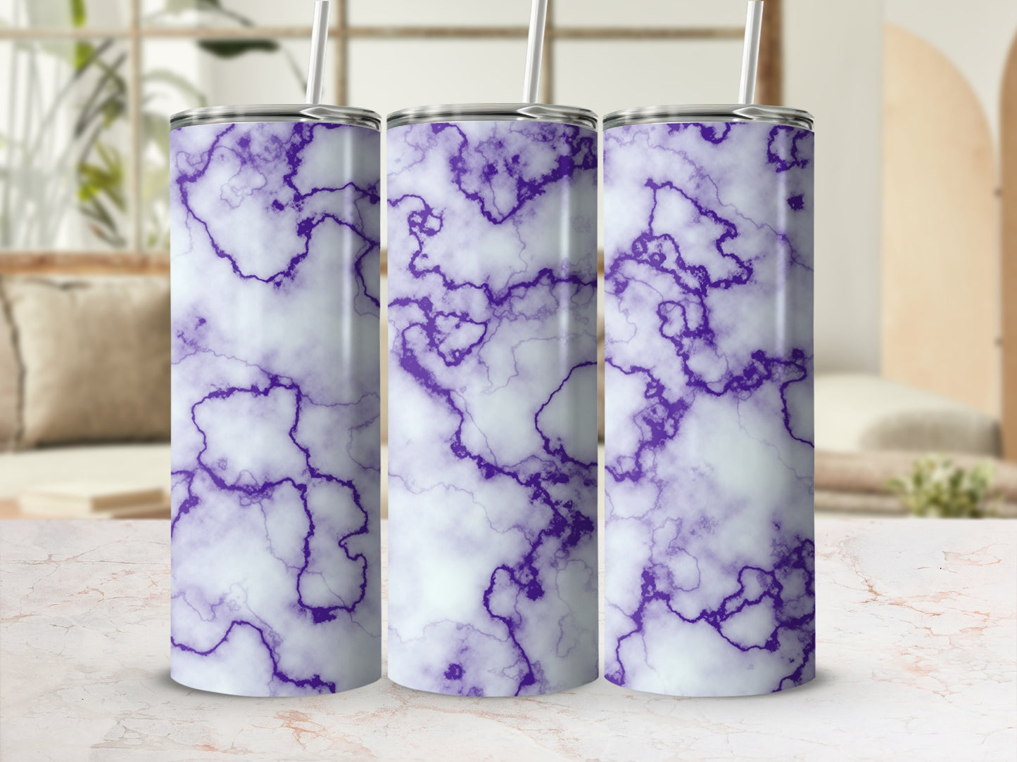 Three tumblers with purple and white marble pattern and straws.