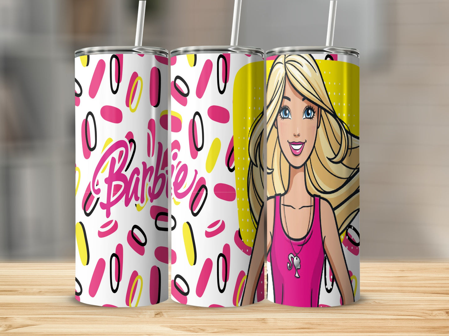 Barbie tumbler with pink, white, and yellow oval pattern.