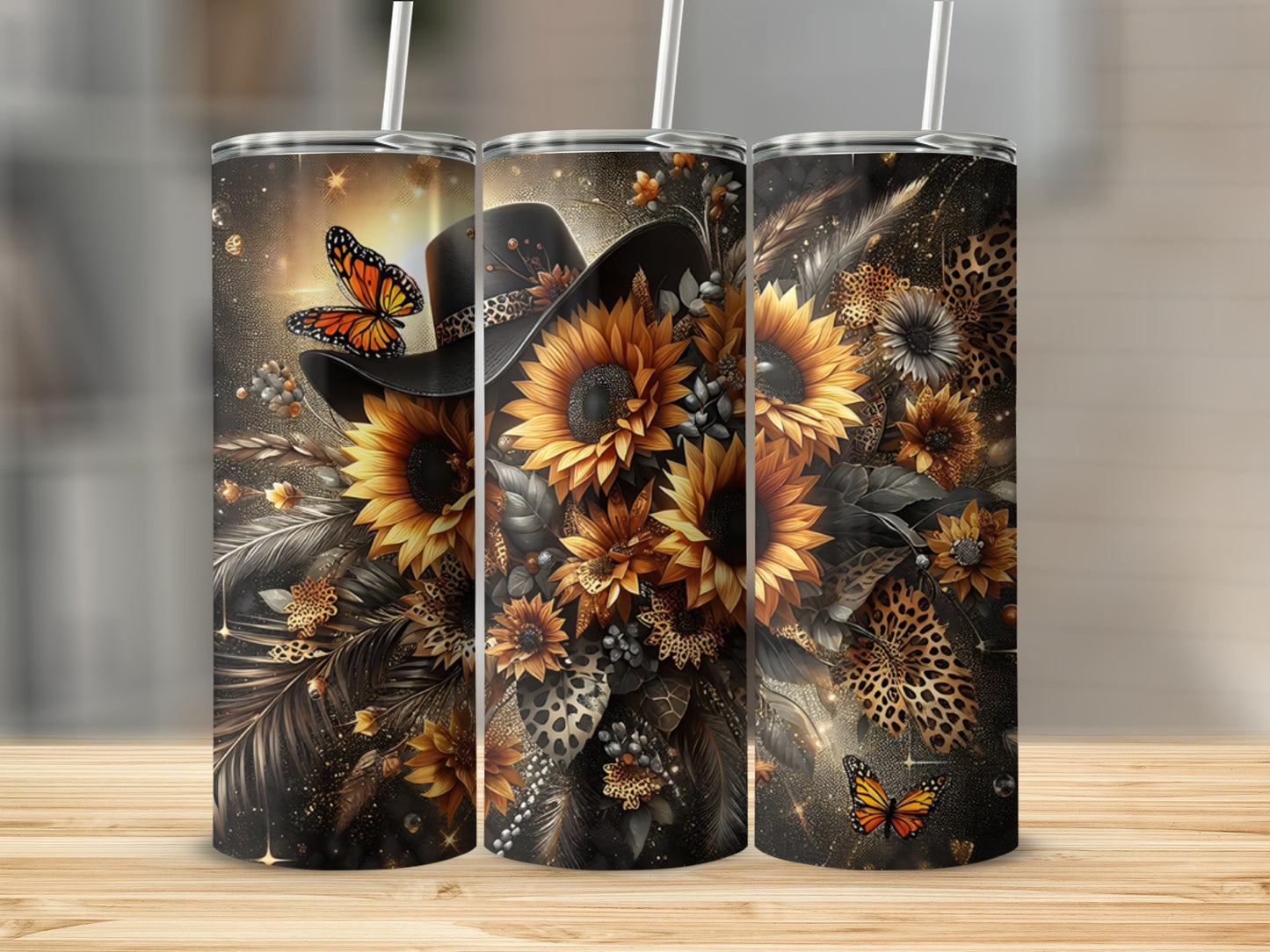 Three tumblers with sunflowers, butterflies, and leopard print designs.