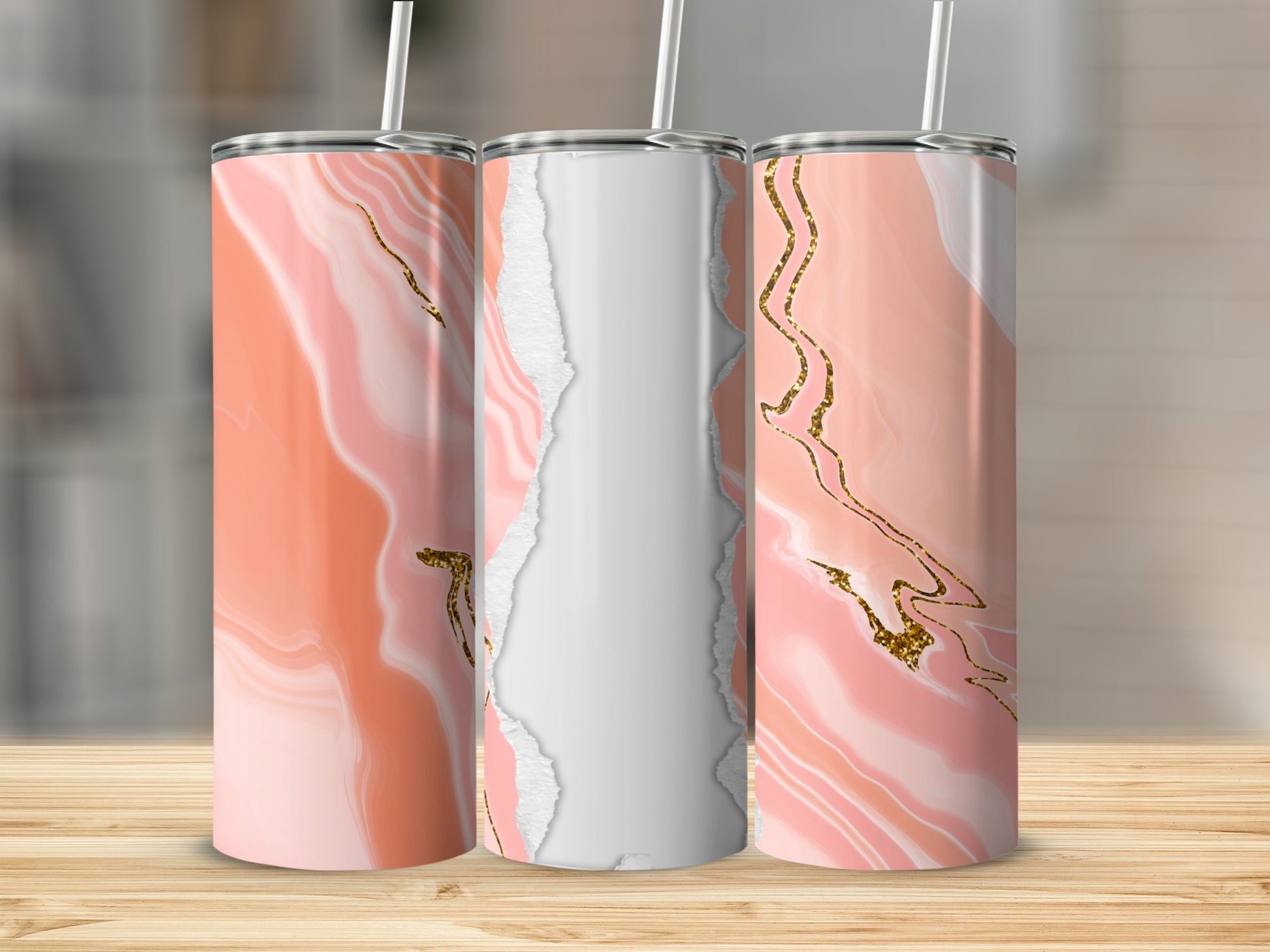 Three skinny tumblers with a pink and white marbled design and gold accents.