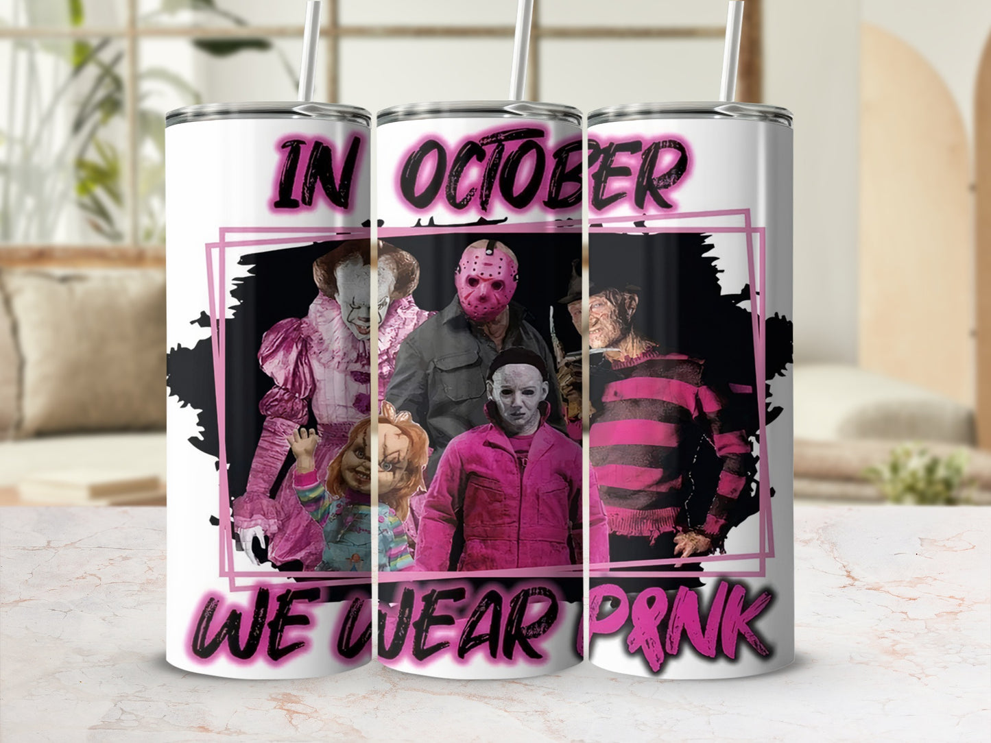 Horror characters in pink, with "IN OCTOBER WE WEAR PINK" text.
