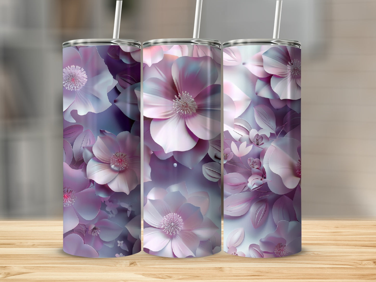 Three tumblers with a floral design in purple and white tones.