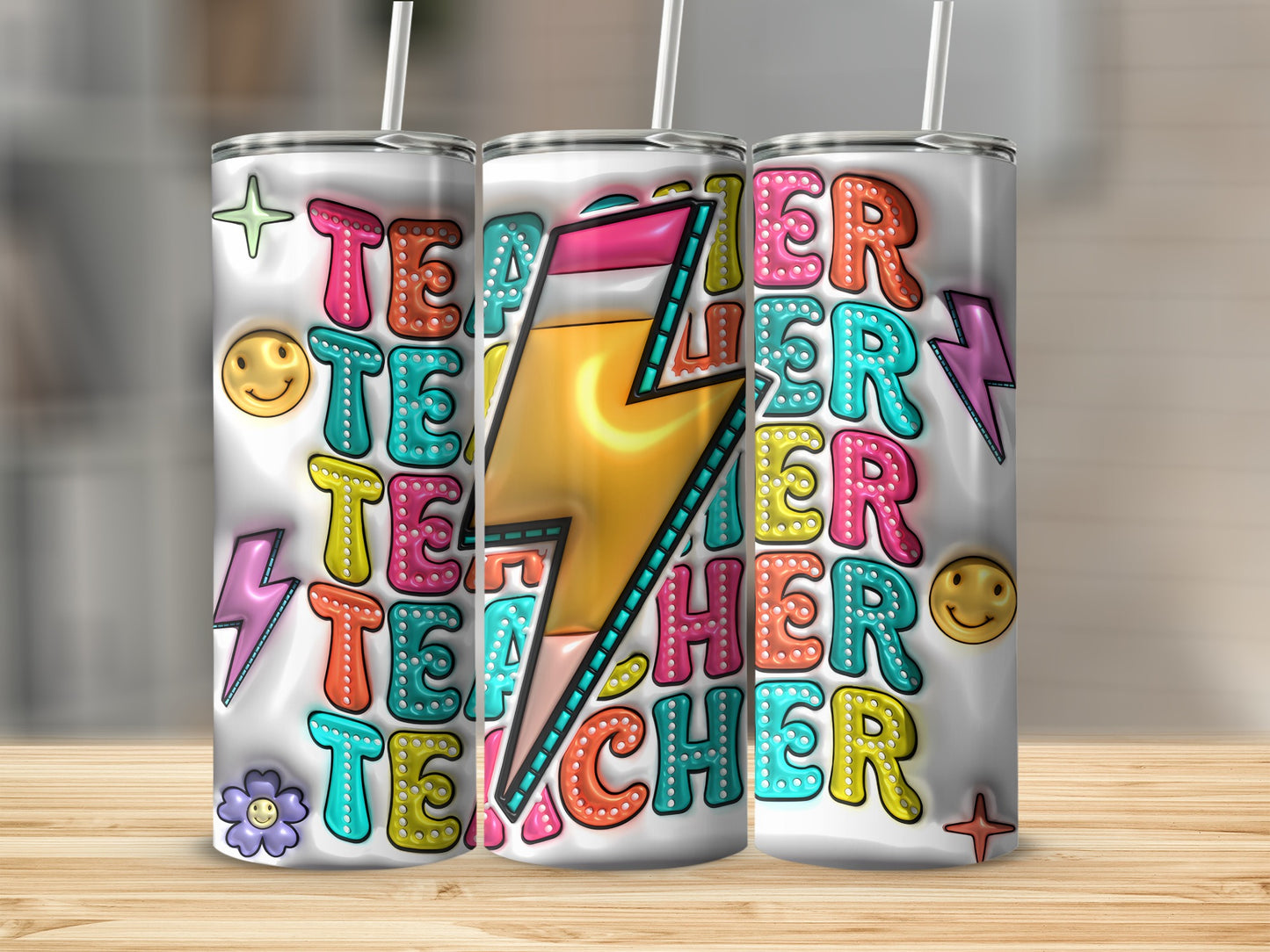 Three tumblers with colorful "TEACHER" text and lightning bolt, smiley face, and flower graphics.